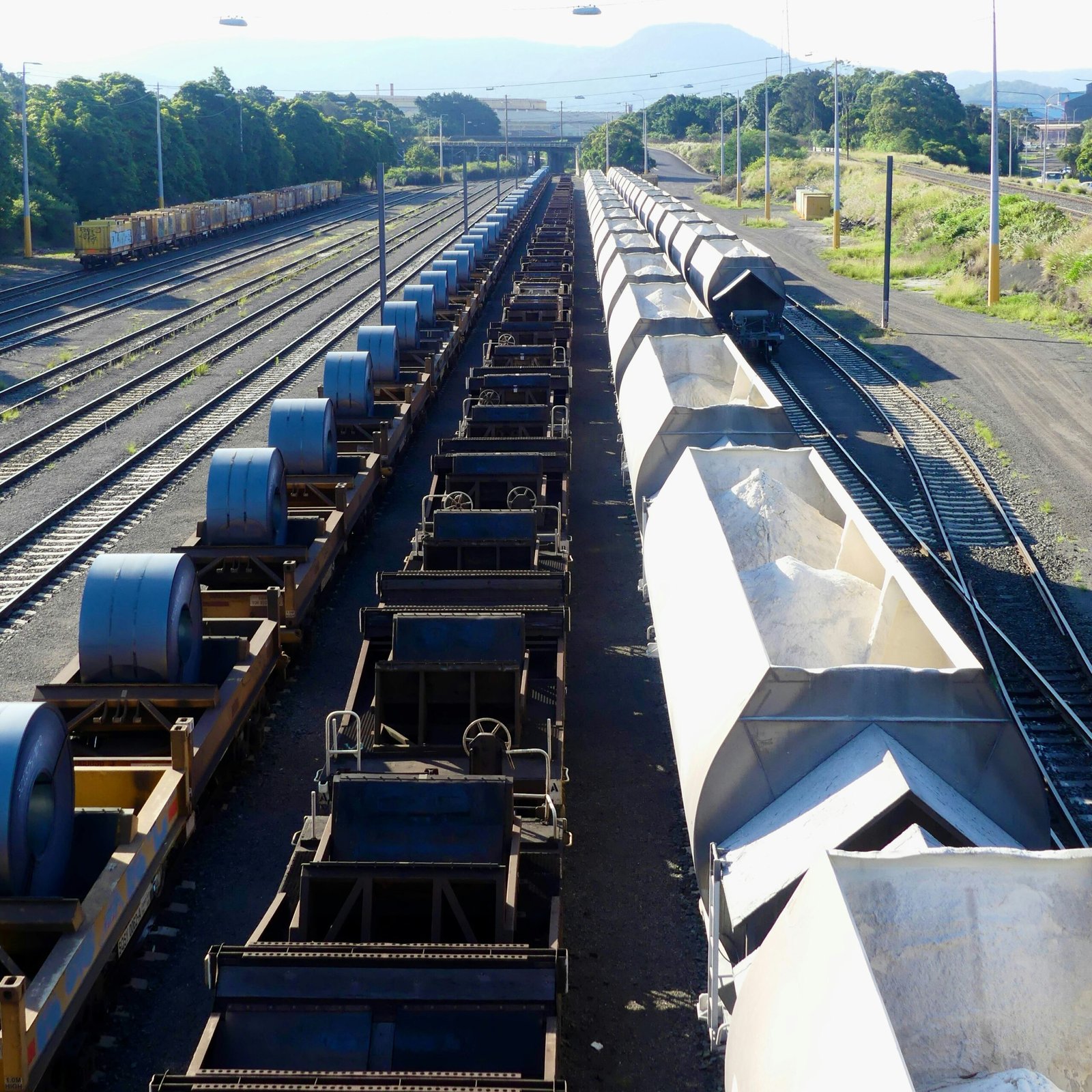 a train yard filled with lots of train cars