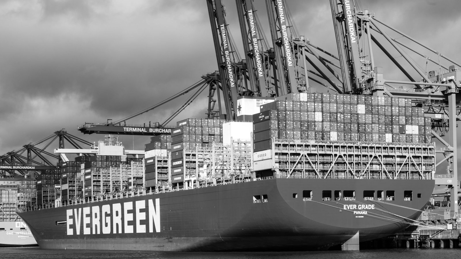 A large cargo ship docked in a harbor