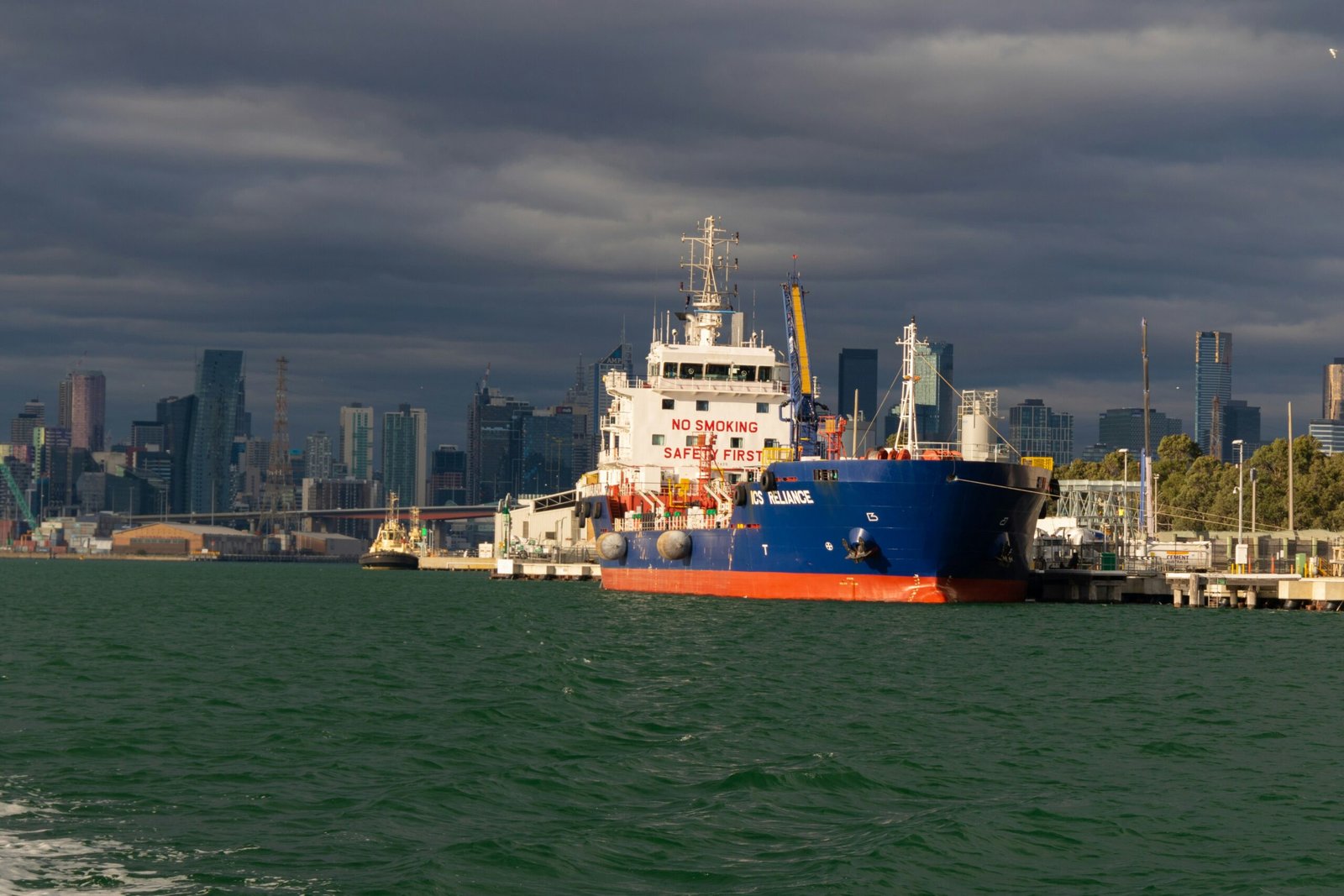 white and red ship on sea during daytime